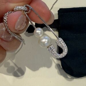 APM pearl safety pin necklace